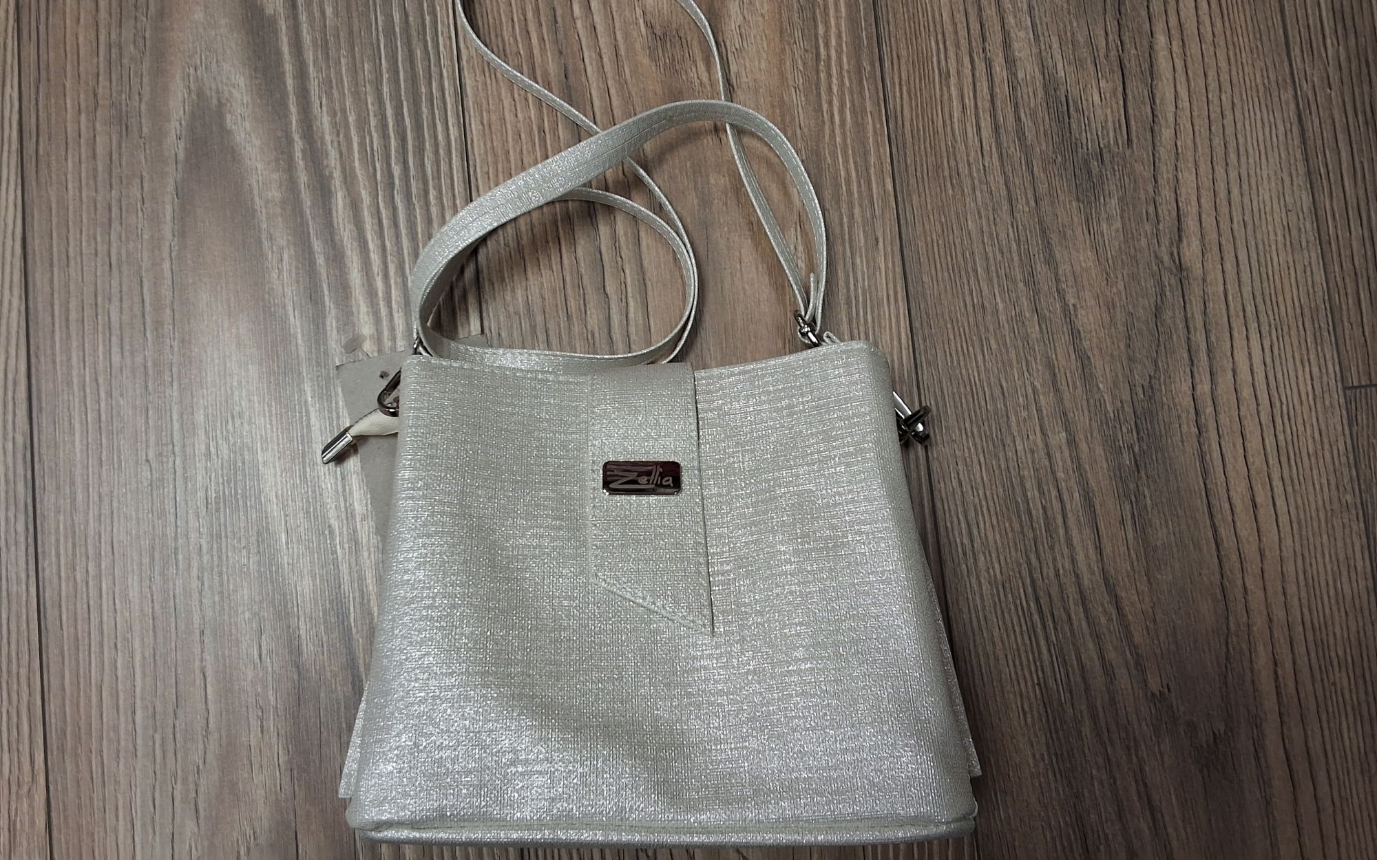 Válltáska, crossover jellegű test táska zvn2105 pezsgő